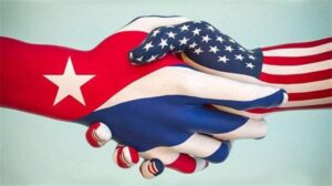 Cuba-EEUU-Manos-Banderas
