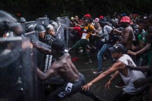 enfrentamiento-de-migrantes