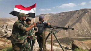 militares-sirios-bandera-arma